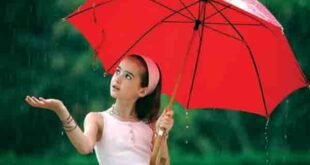 a girl with umbrella in the rain: national life insurance nepal post featured image